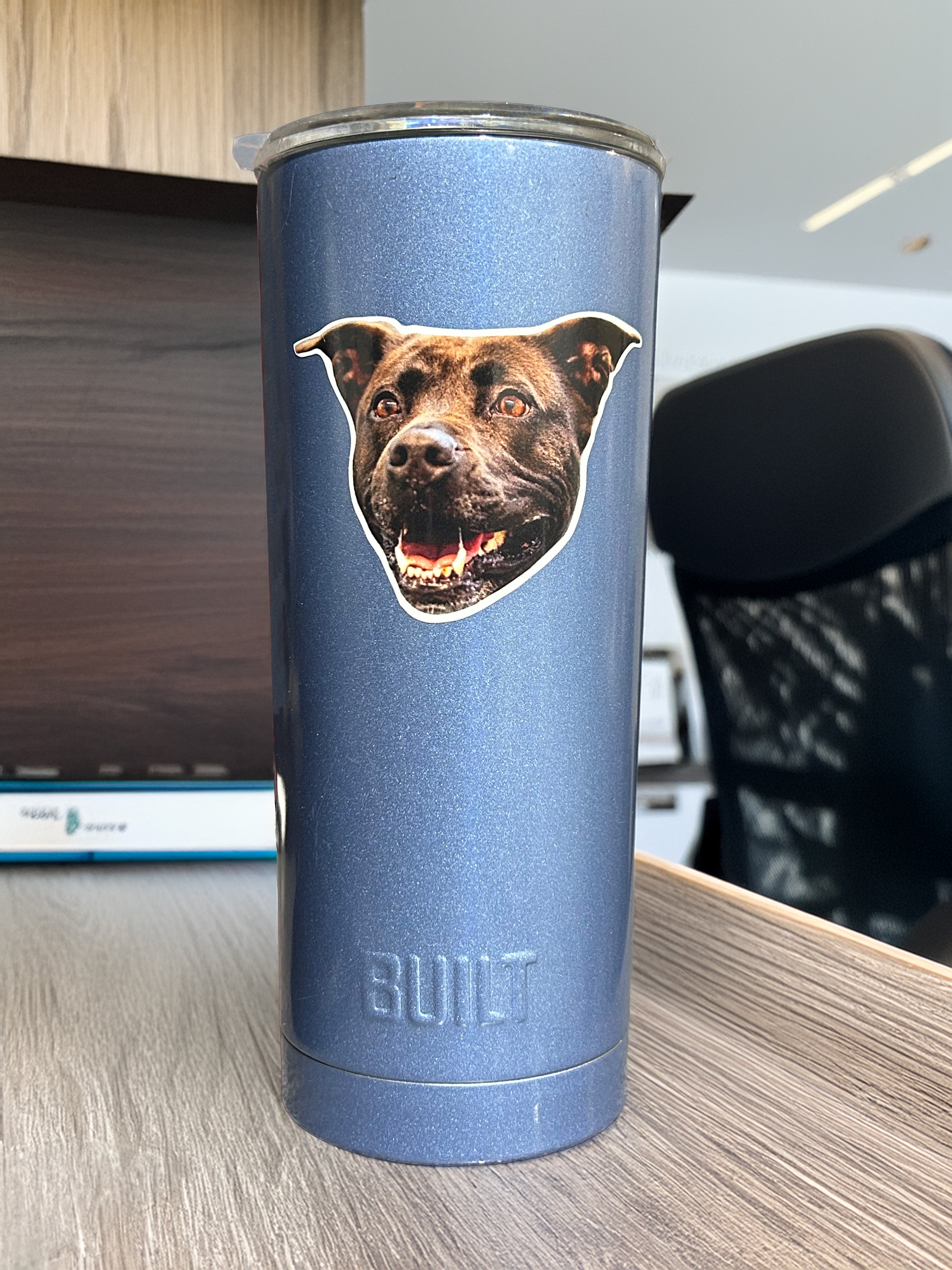 Dog face sticker on a tumbler